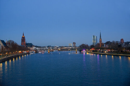 Main River with skyline seen form Eiserner Steg footbridge at German city of Frankfurt on an autumn evening. Photo taken November 22nd, 2025, Frankfurt am Main, Germany.