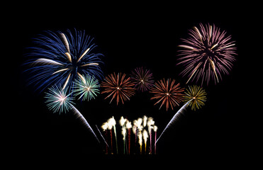 Festive colorful fireworks display isolated on black background for celebration and anniversary