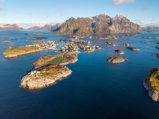 Aerial View of a Norwegian Fishing Village on Small Islands With Mountains and Fjords