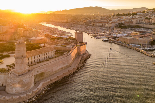 Aerial view of the historic Vieux Port in Marseille at sunrise, southern France