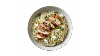 A mouth-watering bowl of pasta topped with grilled chicken, crumbled feta cheese, and fresh herbs