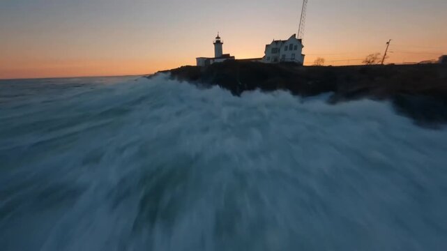 FPV Drone Aerial of Eastern Point Lighthouse at Sunset