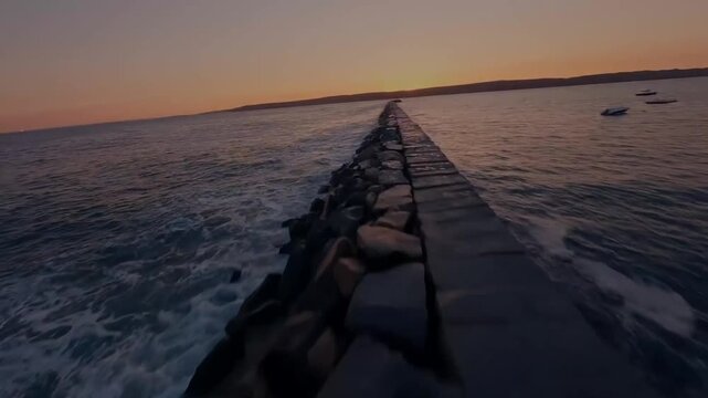 FPV Drone Aerial of Eastern Point Lighthouse at Sunset