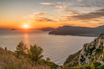 Aerial view of the picturesque Route de Crete road between Cassis and La Ciotat during sunset, southern France.