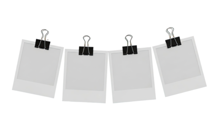 Four Empty Polaroid Photos Hanging with Binder Clips on transparent background
