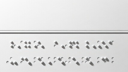 Close-up of Braille text on a white surface, representing accessibility and communication for the visually impaired.