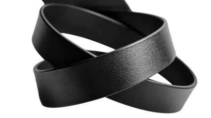 Black leather belt strap looped arrangement with smooth matte texture minimal fashion accessory isolated on white background