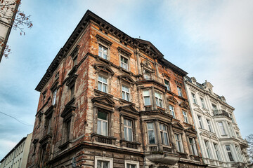 City contrasts in Gdansk. Historic house restoration and renovation