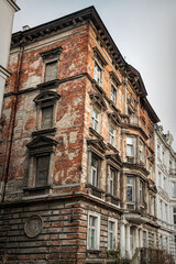 City contrasts in Gdansk. Historic house restoration and renovation