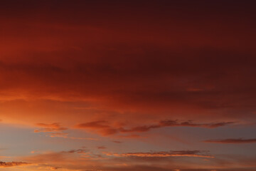 Sunset clouds in the sky in summer evening