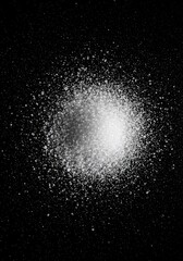 Fine white crystalline sugar is generously sprinkled across a dark, contrasting background, creating an abstract sweet texture pattern ,decorative ,powder ,fine