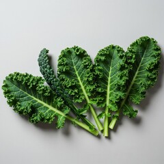 Vibrant, healthy dark green raw kale leaves arranged on a minimalist background, highlighting fresh produce and organic vegetarian ingredients, green, textured, fresh