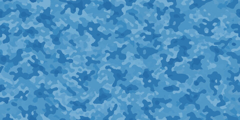 Abstract blue camouflage background with irregular shapes and varying shades © Lalin