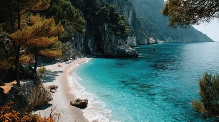 Secluded pebble beach nestled between towering coastal cliffs and vibrant turquoise water