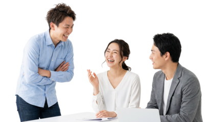 Happy Young Asian Business Team Collaborating at Table