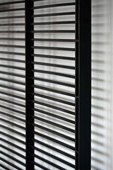 Abstract of Metal grill with shadow for use as a background texture