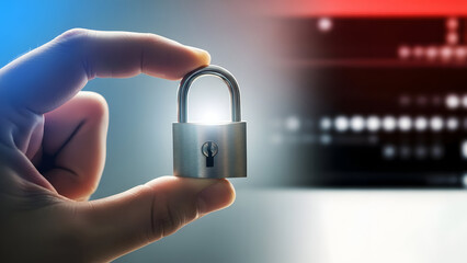 Hand holding a small padlock with a blurred background of digital code