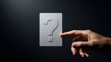 Finger touching a glowing question mark symbol on a dark background.
