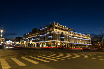 A view of the Metropol Hotel in its festive decorations on a winter evening. Moscow, Russia