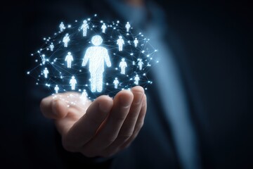 Hand holding glowing network of connected human figures concept