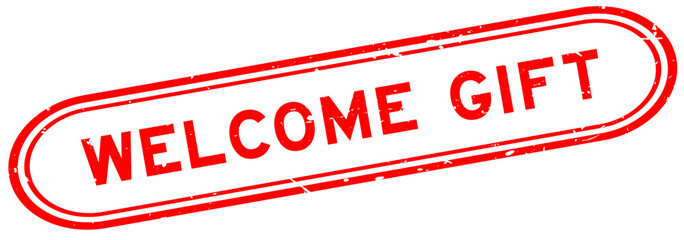 Grunge red welcome gift word rubber seal stamp on white background