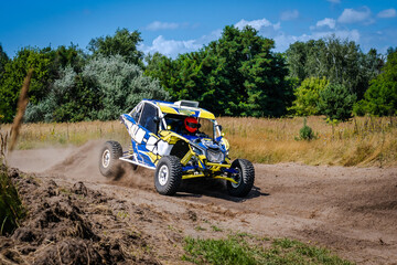 ATV (quad), buggy and UTV in the sand. Amateur competitions