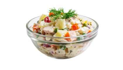 Creamy salad with potatoes, carrots in a glass bowl