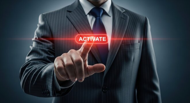 Businessman presses a glowing activate button in a dark digital environment - Powered by Adobe
