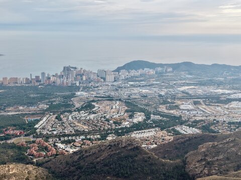 City Spread Growth, Development Spreading Across Valleys With Intricate Roads And Varied Land Use Visible