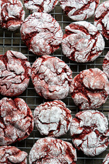 Homemade Strawberry and Red Velvet Crinkle Cookies on Cooling Rack. 