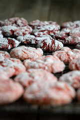 Homemade Strawberry and Red Velvet Crinkle Cookies on Cooling Rack. 