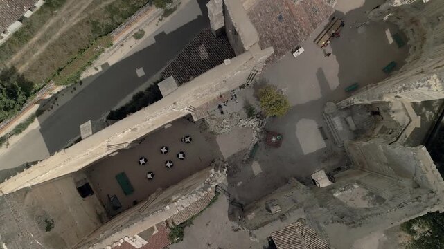 Vertical drone panorama of the ruins of the medieval San Anton church on the Camino de Santiago pilgrimage route.