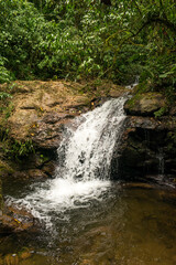 Small waterfall at Rio Macaquinho, tourist destination in Estrada Rio do Julio - Schroeder, Santa Catarina, Brazil