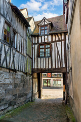 Half-timbered buildings in the historic center of Rouen, France. Rouen is the capital of Normandy. Half-timbered houses are a hallmark of the city.