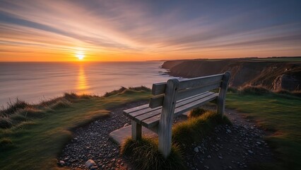 Golden sunset over the vast ocean, viewed from a solitary wooden bench on a scenic cliff, inviting moments of peaceful contemplation and breathtaking natural beauty