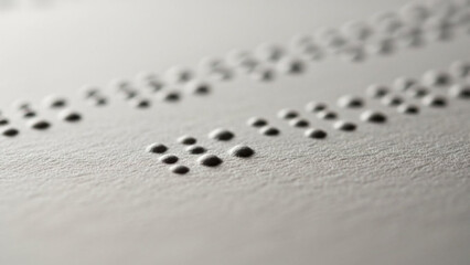 Close-up of Braille text on textured paper representing literacy and accessibility for the visually impaired a tactile reading system