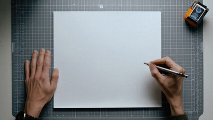 Hand drawing on a blank piece of paper
