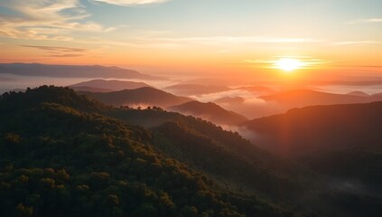 Aerial View of Colorful Sunrise Over Misty Mountain Forest. Scenic Nature Landscape