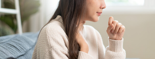 Women have a cough and a sore throat, and feel sick and cold.