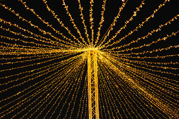 Radiant Canopy Of String Lights Overhead Golden Filaments Stretch From Central Pole Creating Radial Pattern Warm Bokeh And Twinkle