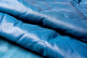 Nylon, slippery, waterproof dark fabric