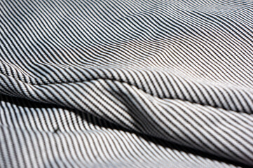 Close-up of thin cotton fabric with black and white stripes