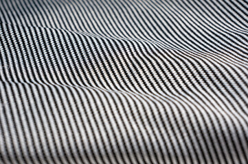 Close-up of thin cotton fabric with black and white stripes