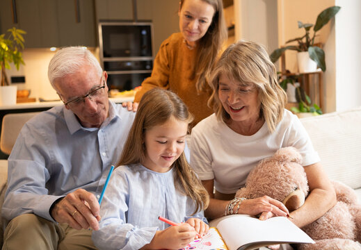 Multi-generational family enjoying a creative activity, bonding and sharing moments