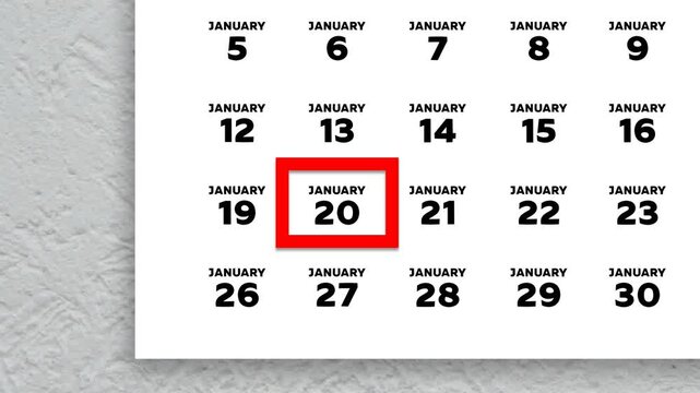 The date January 20th marked with a red cursor on the wall calendar 2026