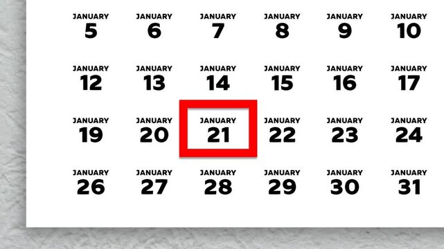 The date January 21st marked with a red cursor on the wall calendar 2026