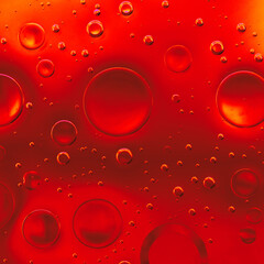 Abstract macro of red liquid with floating bubbles and glossy texture. Ideal for bold backgrounds, beauty branding, cosmetic advertising, mobile design, and modern visuals
