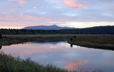 Sunrise over mountains and water, Grand Teton National Park, Wyoming  USA
