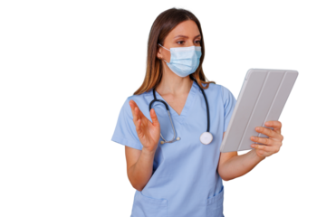 Female nurse or doctor wearing face mask and scrubs conducting telemedicine consultation on a digital tablet