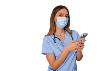 Female medical worker in scrubs and face mask checking smartphone, symbolizing healthcare technology and telehealth communication